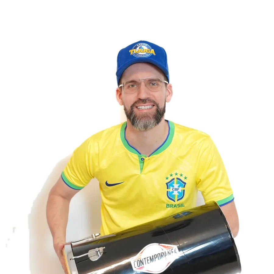 Samba musician with surdo in a yellow Brazil jersey